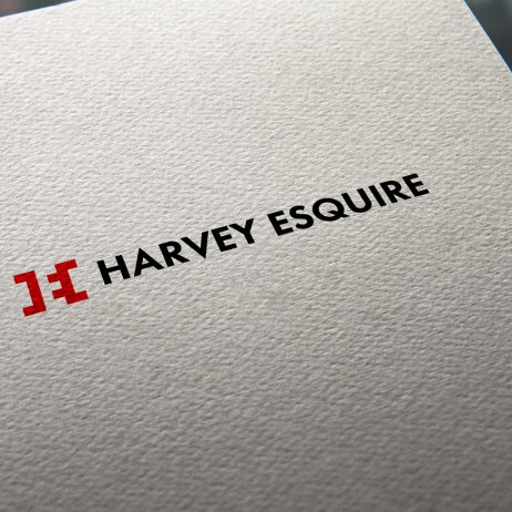 Harvey Esquire logo business card mock-up